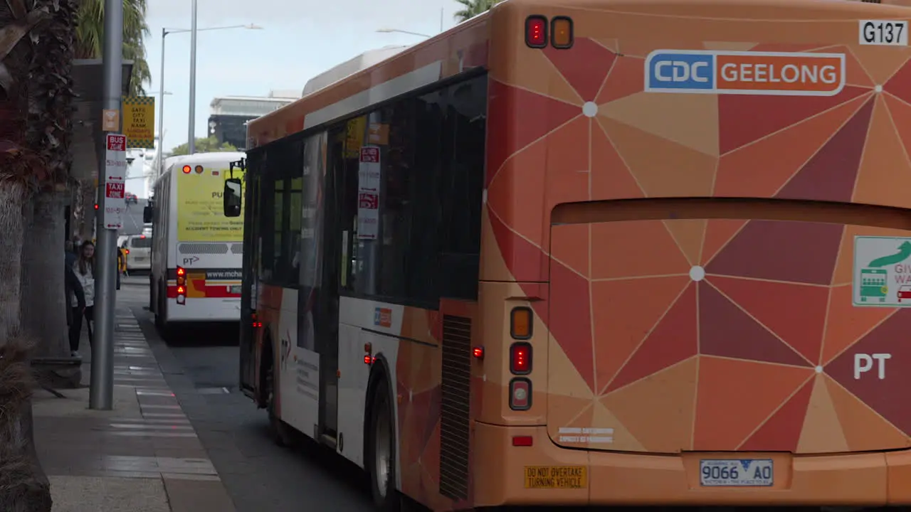 Public Transport Bus Pulling Up To City Bus Stop SLOW MOTION