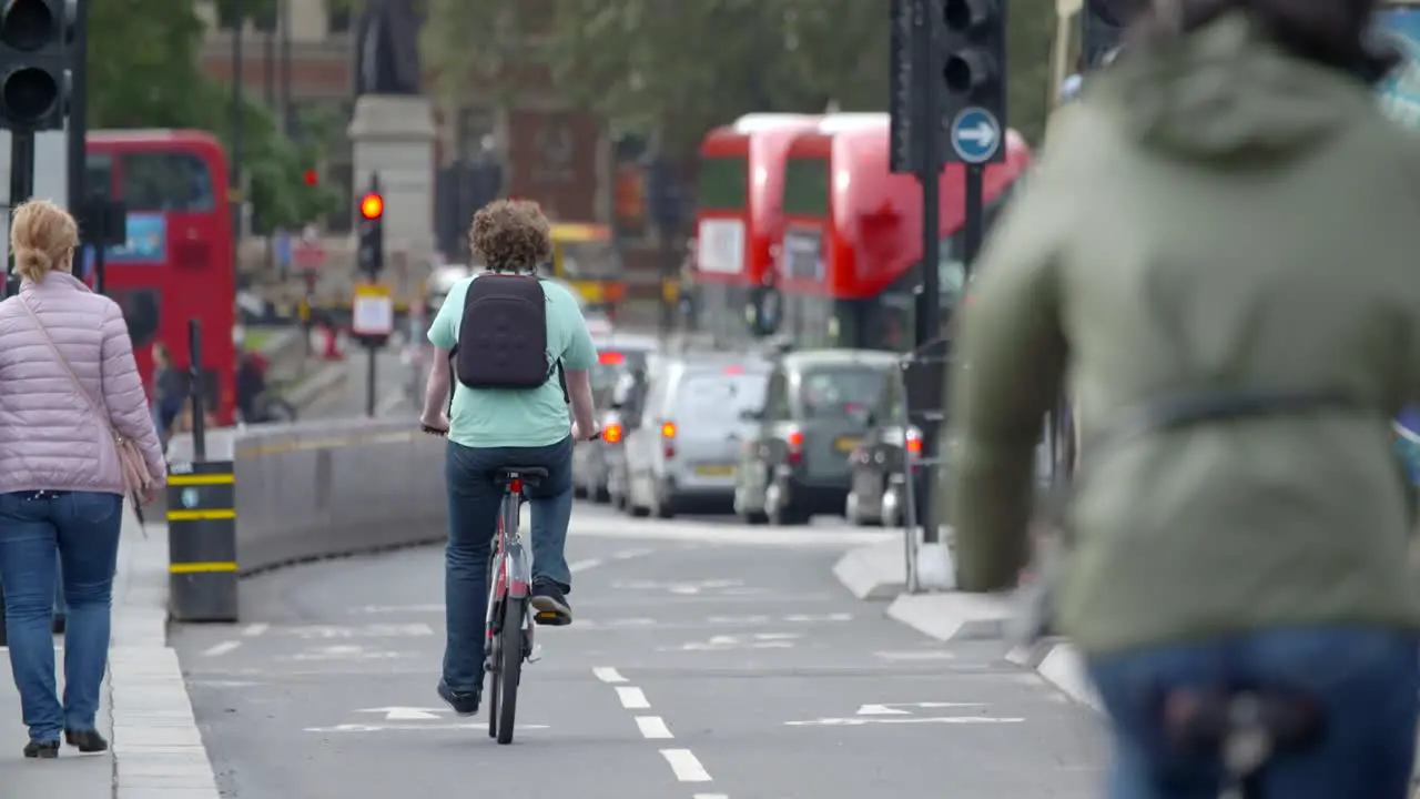 People Cycling Over Westminster Bridge