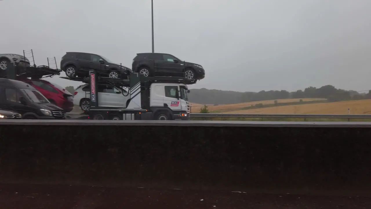 Side view of fast moving traffic on M1 motorway