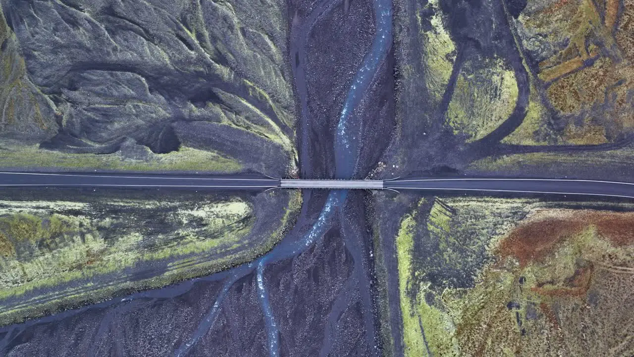 Top Down View Of Bridge With Vehicles Traveling In South Iceland aerial drone shot