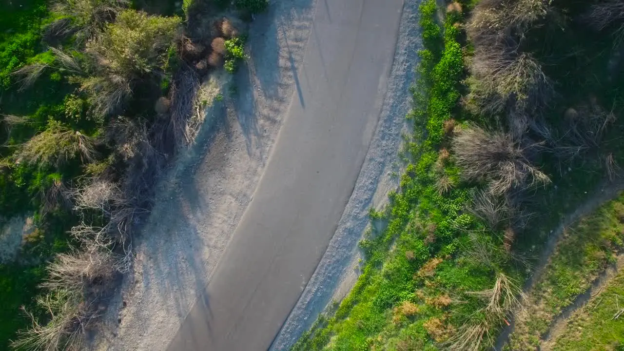 Aerial directly above a motorhome traveling on a country road