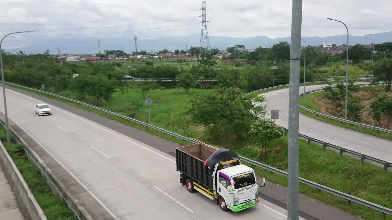 The condition of the toll road looks deserted cars are passing on toll roads