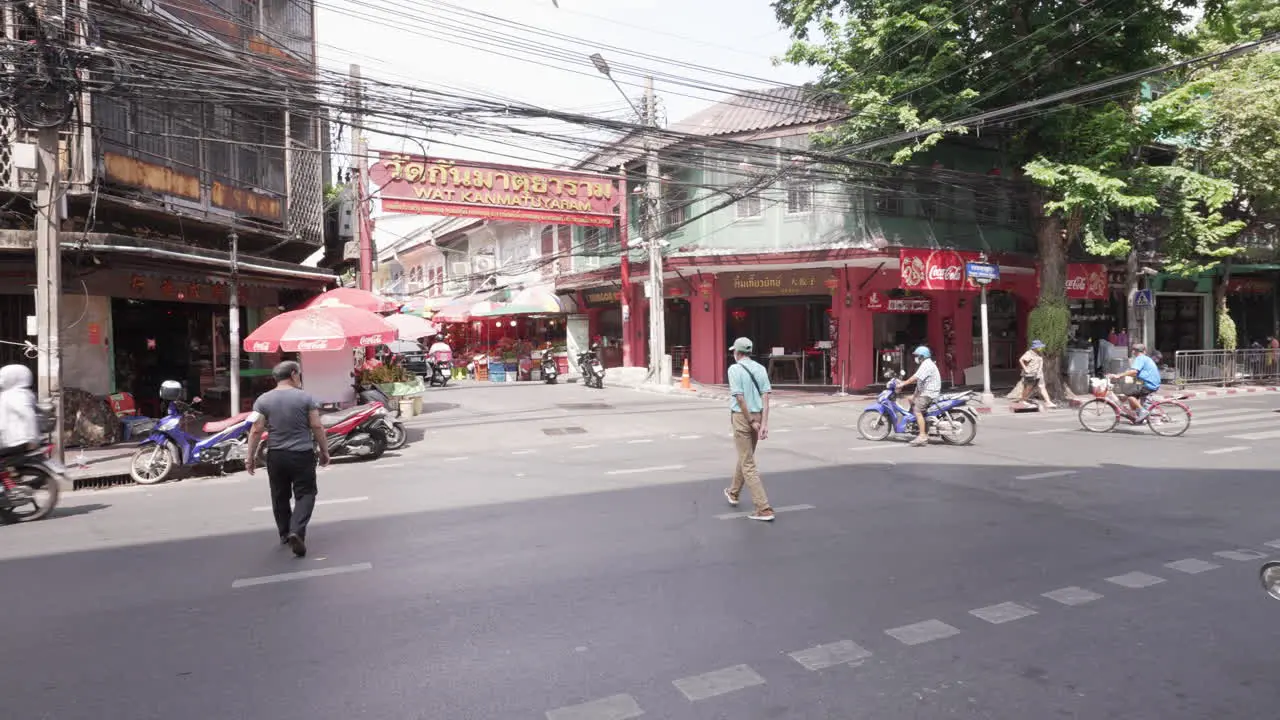 Downtown Chinatown Tuk Tuk and Busy Traffic in Bangkok Thailand