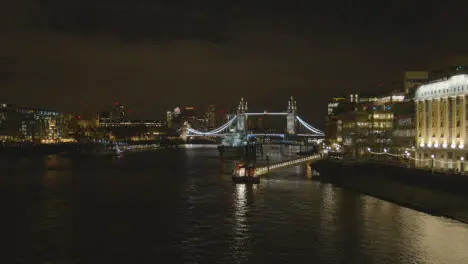 Tower Bridge And City Skyline With HMS Belfast On River Thames London UK At Night 2