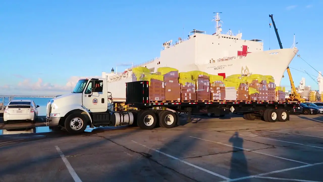 Surgical Masks And Gowns And Other Protective Medical Supplies Are Trucked To The Us Navy Mercy Hostpital Ship During Covid19 Coronavirus Outbreak Epidemic