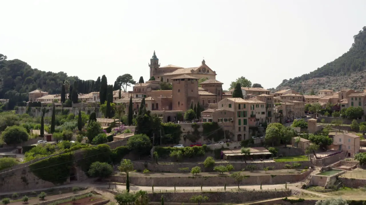 Historical Royal Charterhouse of Valldemossa above garden terraces