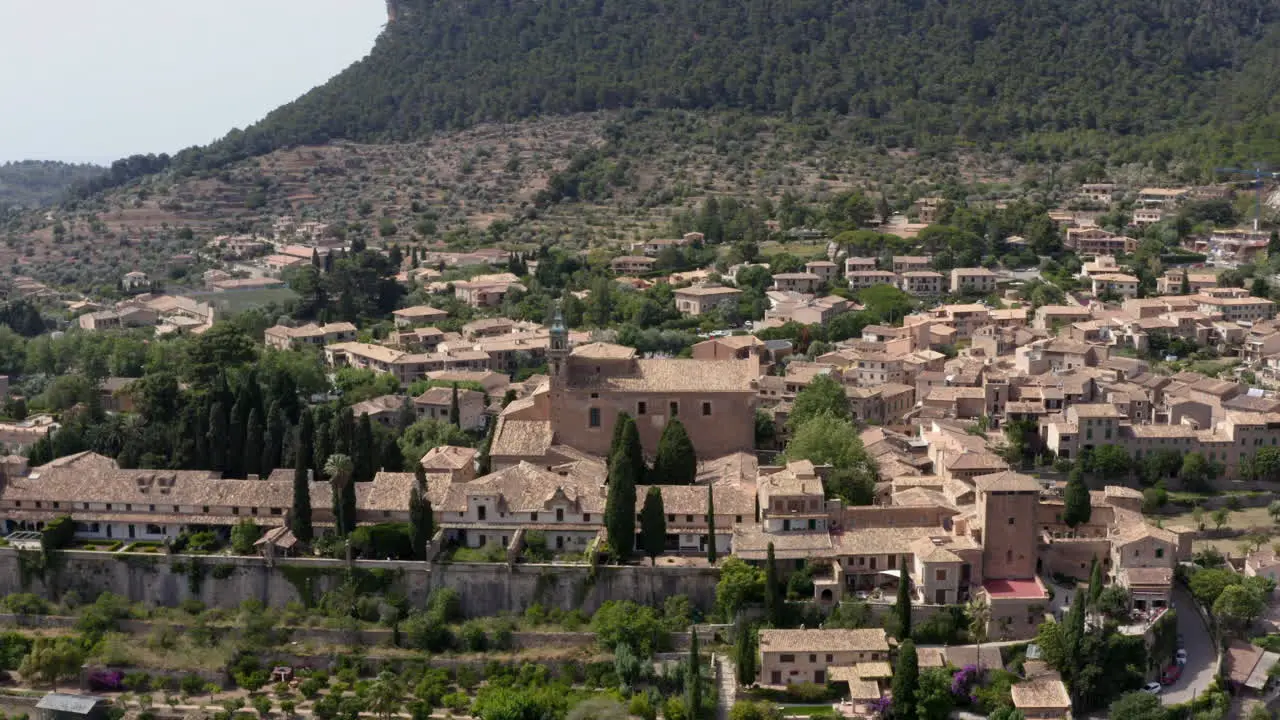 Royal Charterhouse of Valldemossa with historical village around