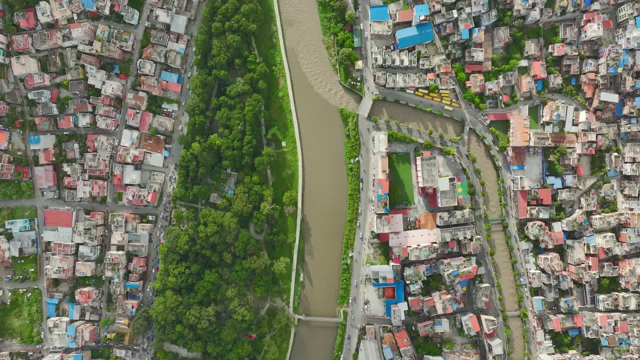 Drone shot Green City Kathmandu Nepal Electric Vehicles River Urban modern Houses architectures Road