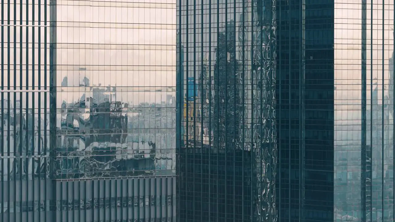 Wide Shot of Buildings with Reflection of Sunset 