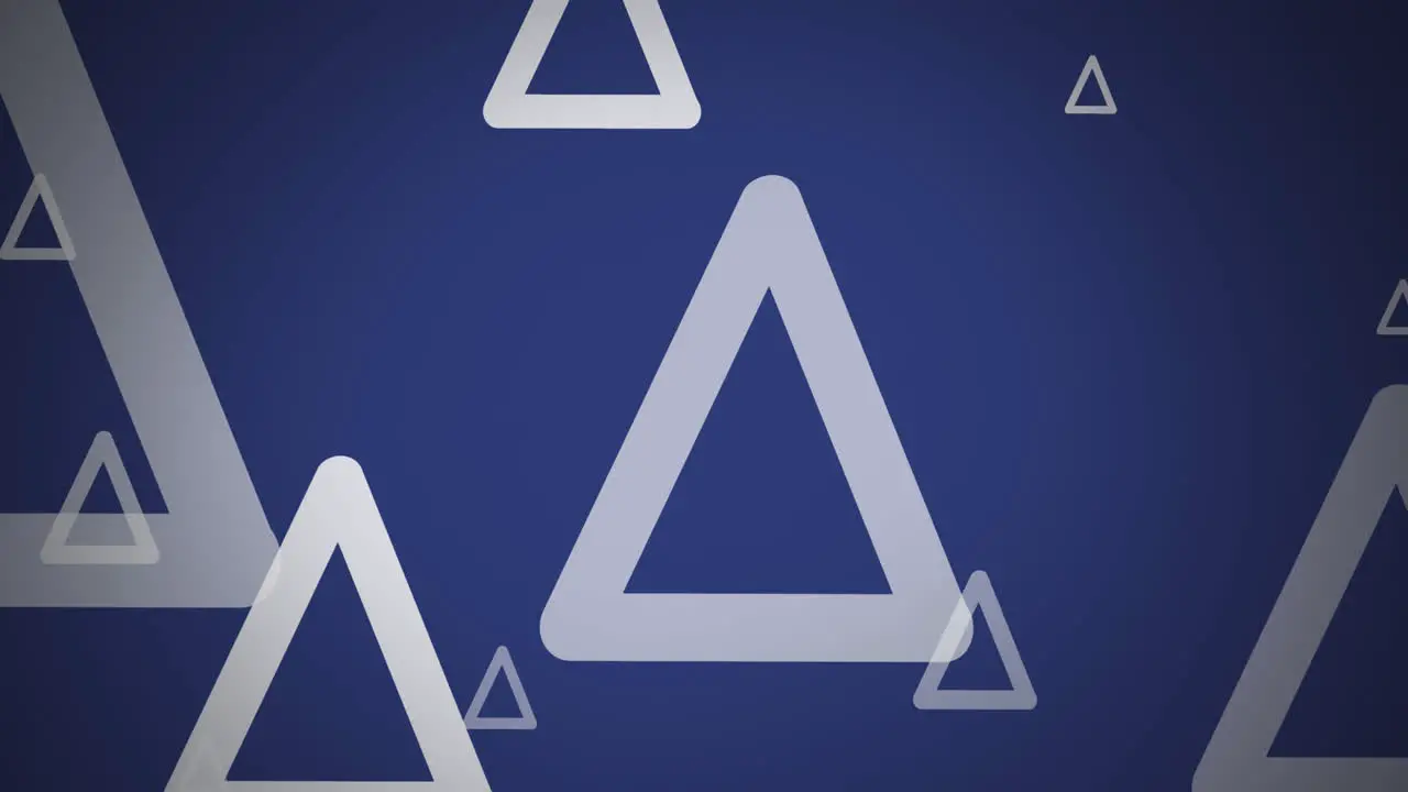 Animation of multiple triangular shapes floating against copy space on blue background