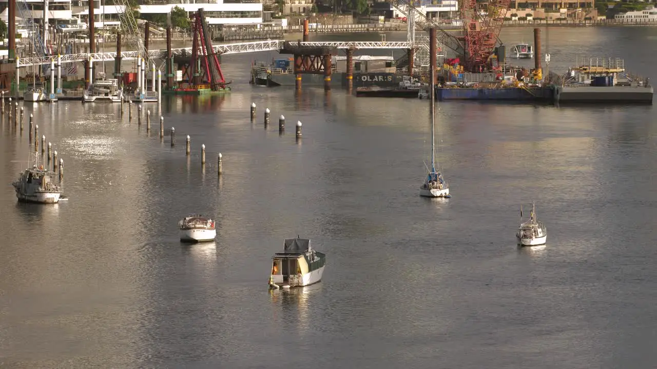 Boats on the Brisbane River Brisbane City from Kangaroo Point Queensland Australia