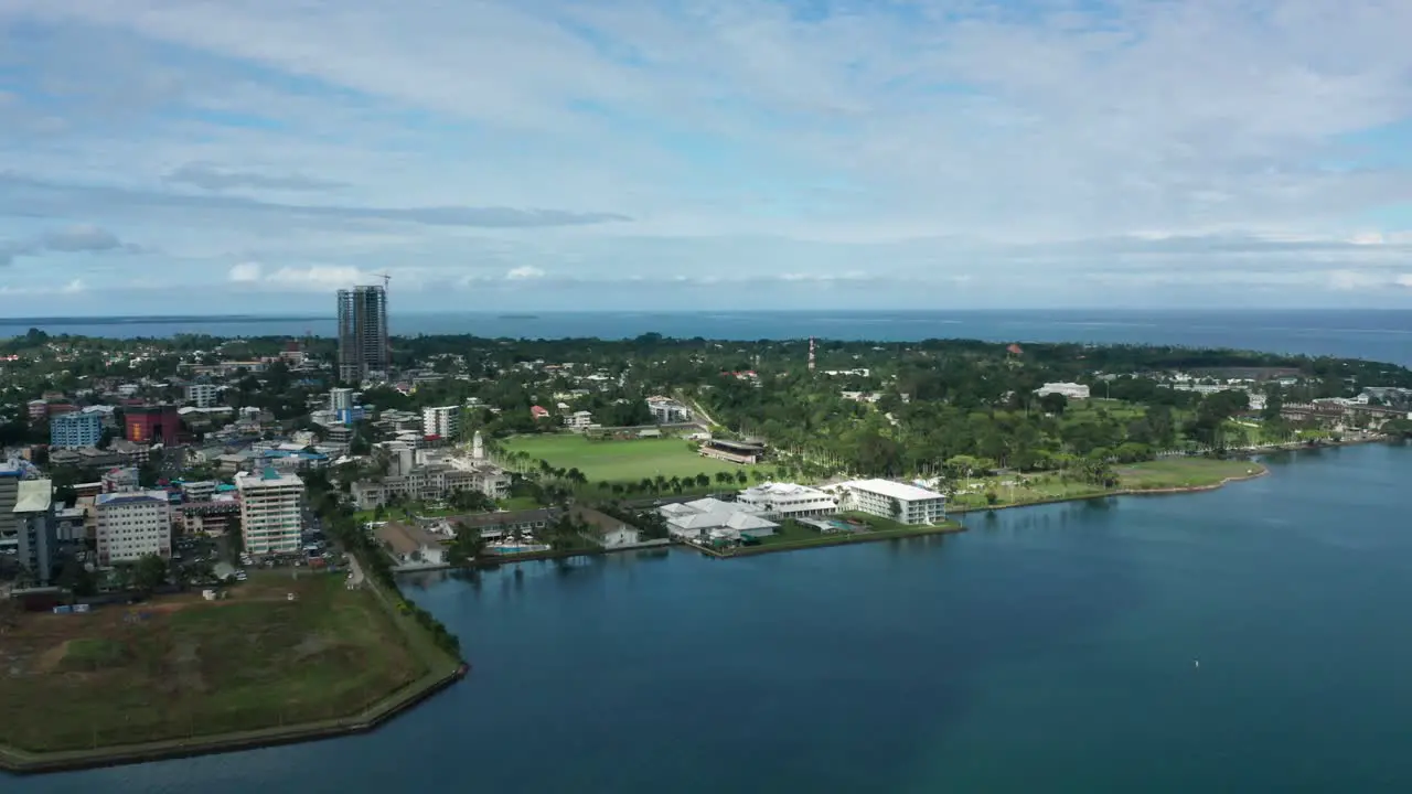 Aerial of peninsula city Suva on mainland of Fiji view of Albert Park urban