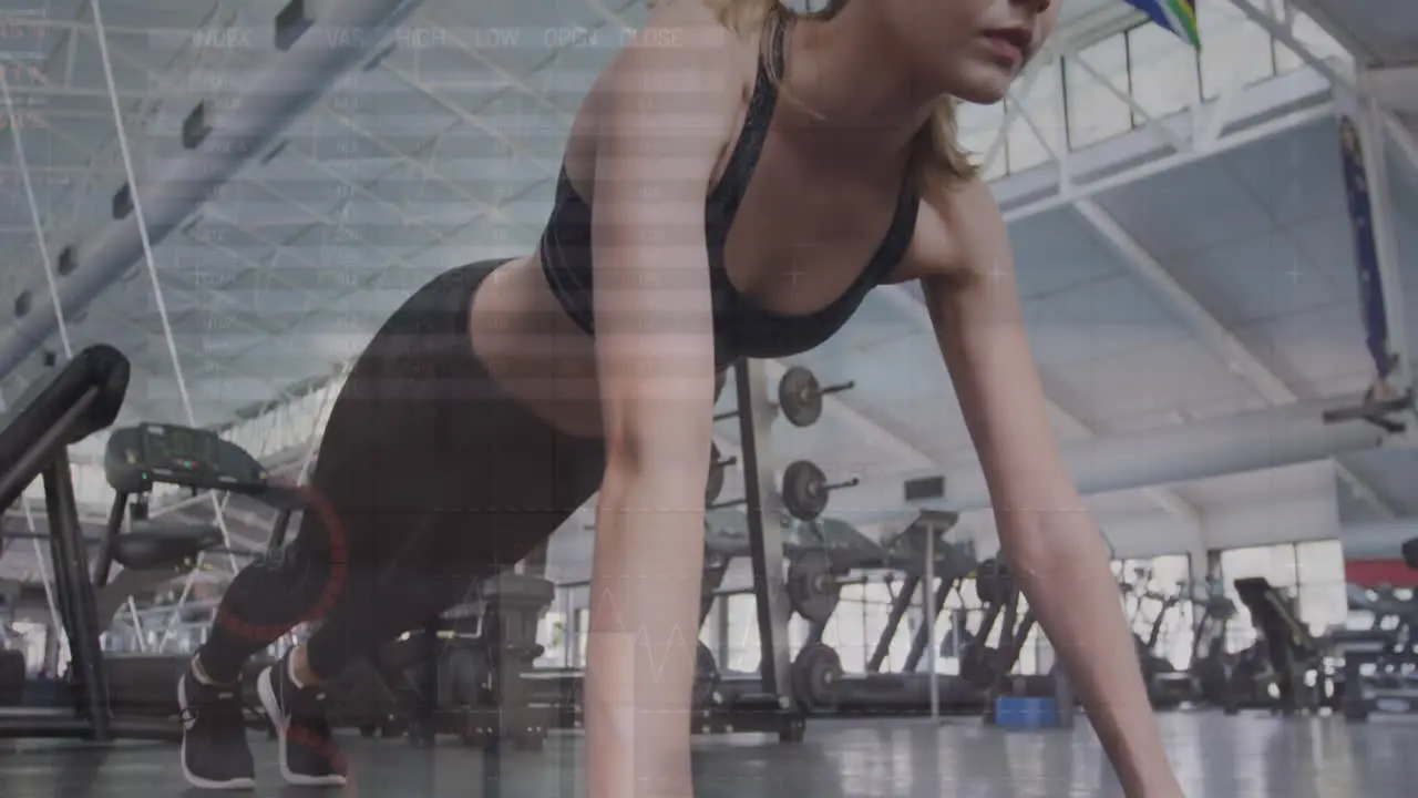 Animation of statistical data processing over caucasian fit woman performing push ups at the gym