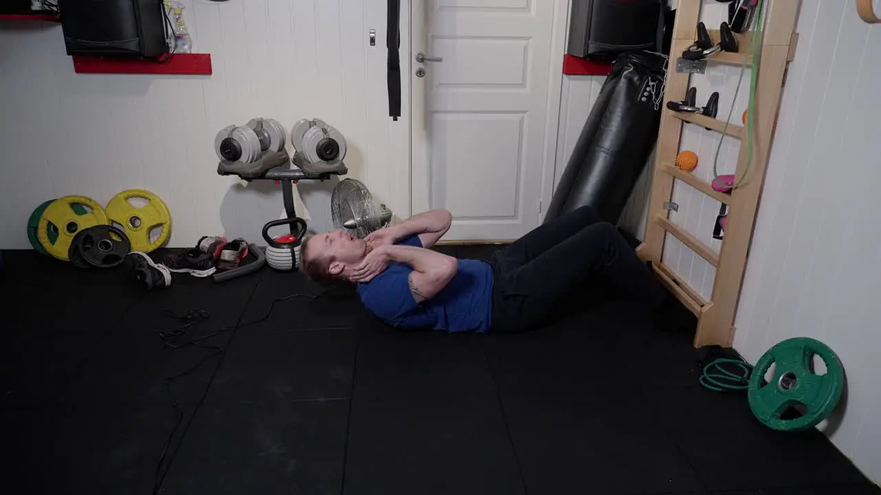 Focused Rib Wall Sit-Ups Consistent and Strong in home gym