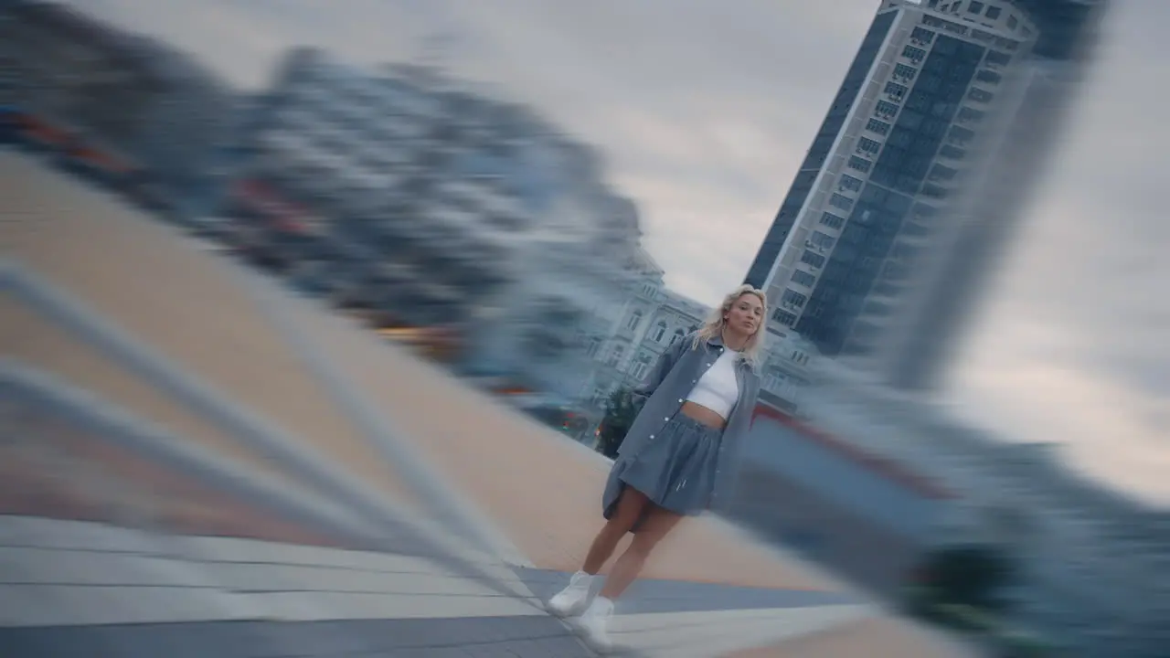 Young woman standing city at sunset in urban area modern architecture