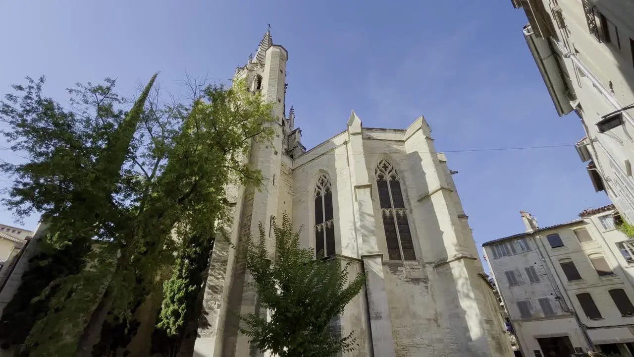 Imposing church in Avignon France in a city in good weather