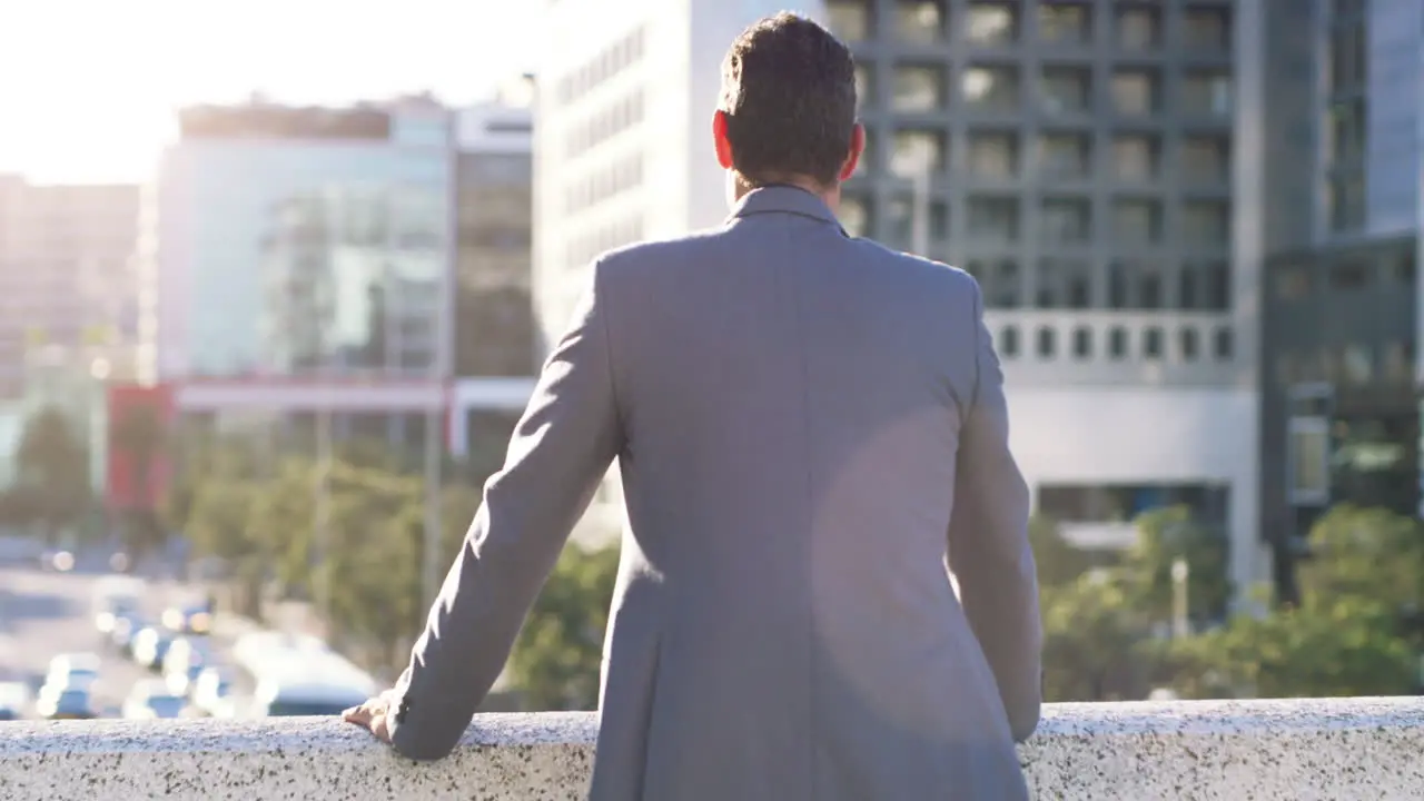 Cityscape sunrise and business man from back