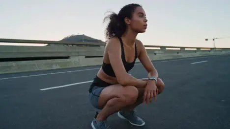 Black woman fitness rest and runner on city road