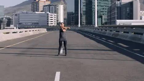 Stretching running and woman in the city street