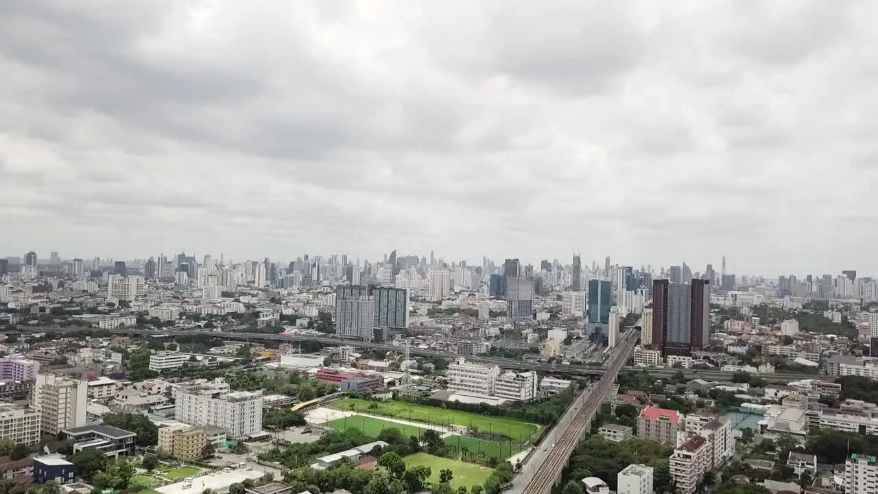 Aerial Of City With Towers High Rise Flats In Background Cloudy Day Bangkok