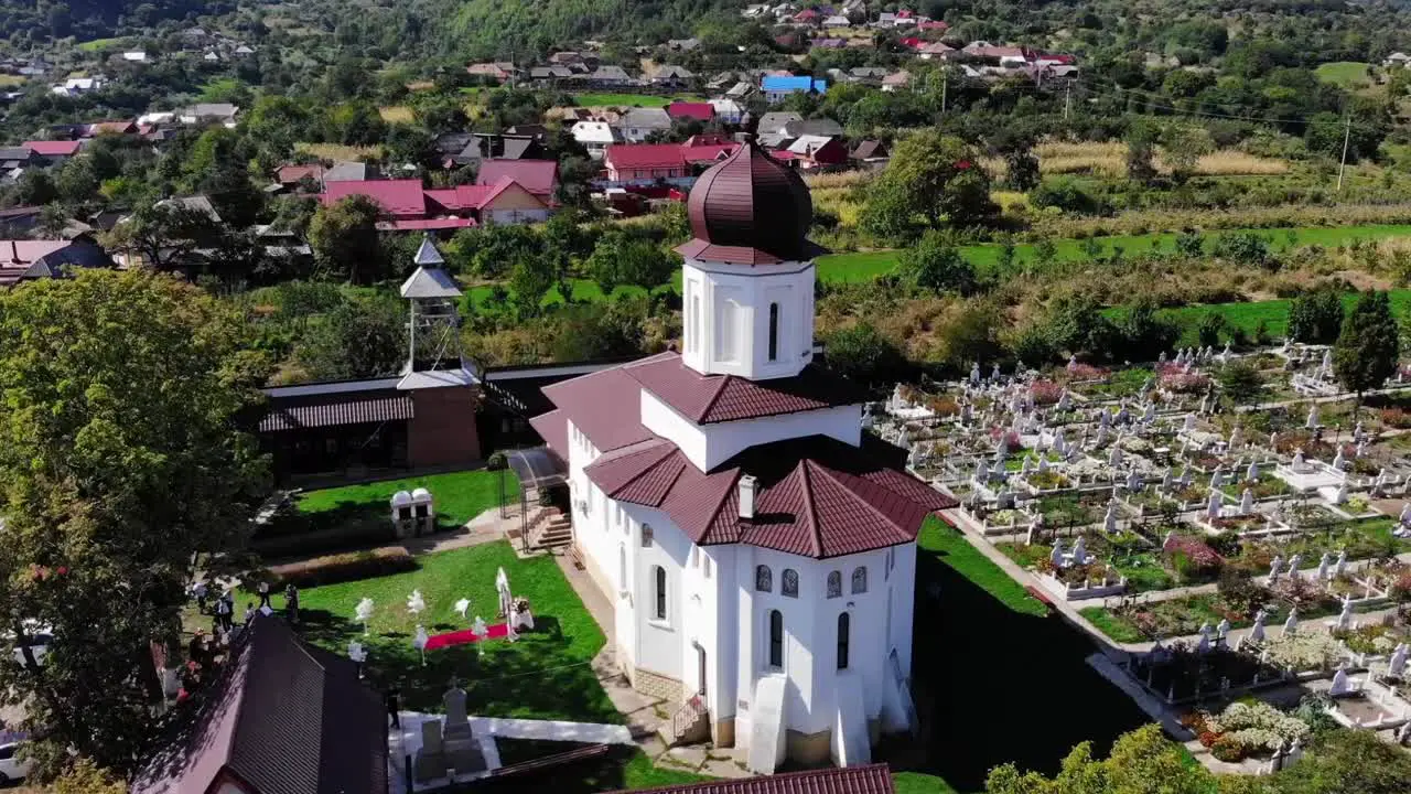 Drone Aerial Over Orthodox Church In Romania Sunny Countryside