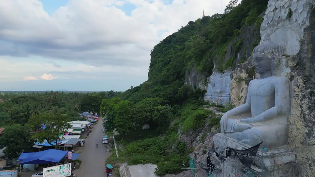 Stone Buddha Sculpture on Hillside Battambang Cambodia 4K