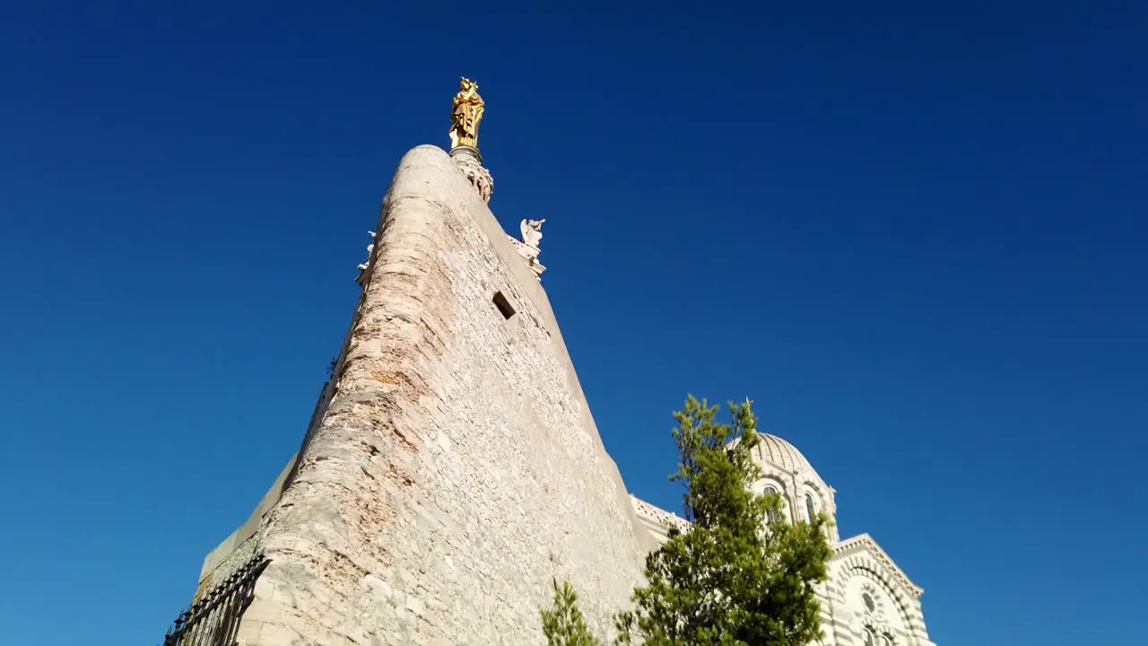 Famous historic landmark Notre Dame de la Garde in France cinematic movement