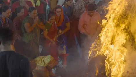 People Celebrating Hindu Festival Of Holi With Bonfire In Mumbai India 7