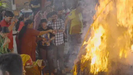 People Celebrating Hindu Festival Of Holi With Bonfire In Mumbai India 5