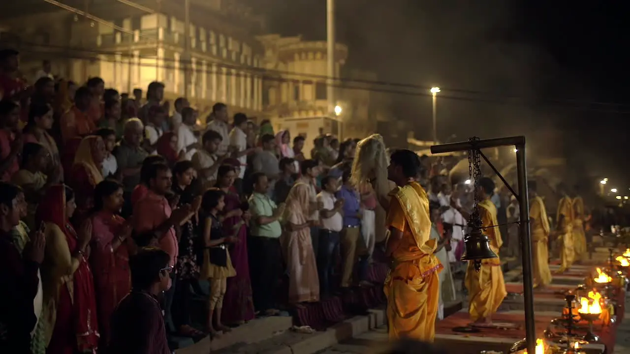 Men and Women Praying at Ceremony in Varanasi