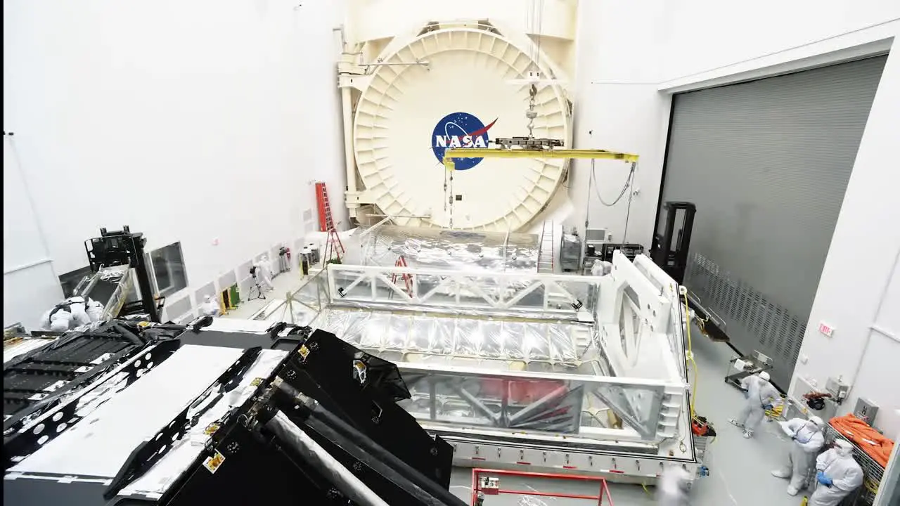 Time Lapse Photography Shows Engineers Working With the Webb Space Telescope At the Johnson Space Center