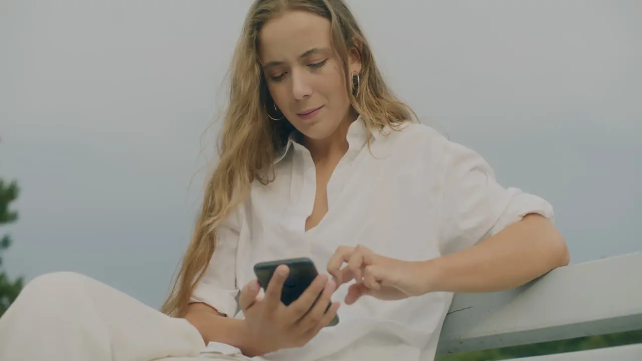 Woman Browsing Smartphone