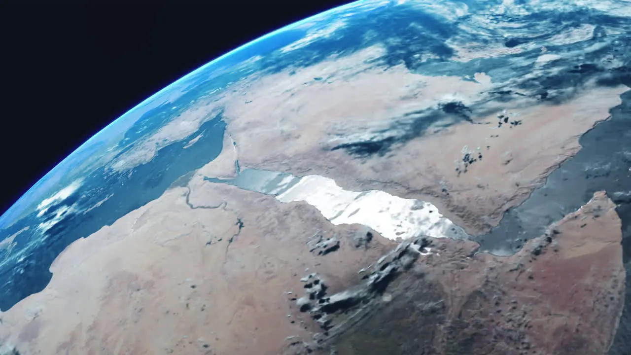 Egypt North Africa from Space with Earth Rotating with Red Sea and Suez Canal Visible with View from Orbit with Clouds Sea Atmosphere and Strong Sun Reflection on Ocean Sea