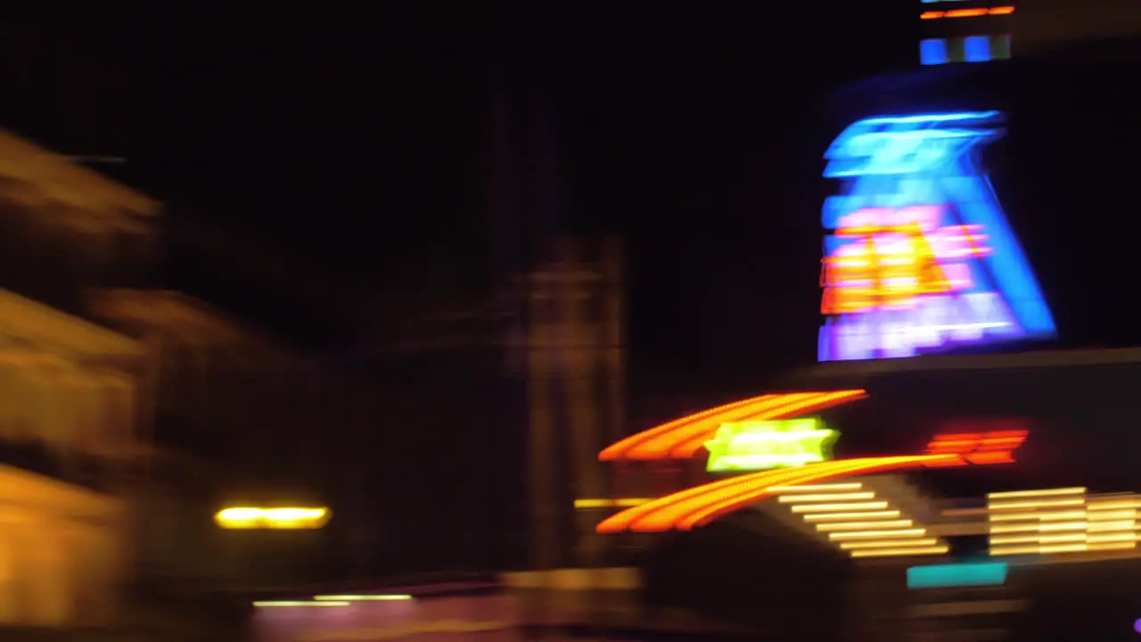 La Diva club banner at night and rotating shot of street in Paris France