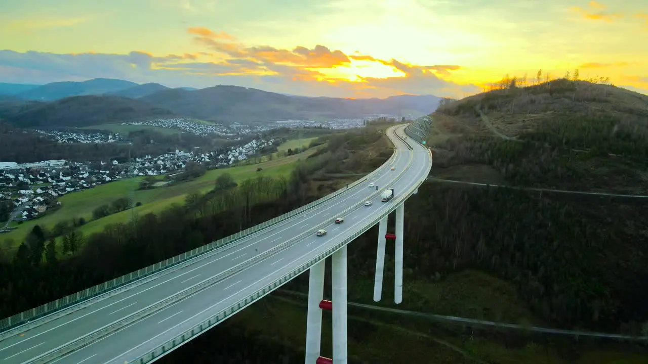 Golden Hour Cars and Trucks Crossing North Rhine-Westphalia's Tallest Autobahn Bridge Talbrücke Nuttlar