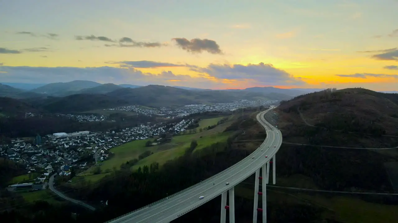 Golden Hour on Sauerland's Tallest Autobahn Bridge Talbrücke Nuttlar An Aerial View of traffic flow on Autobahn 46