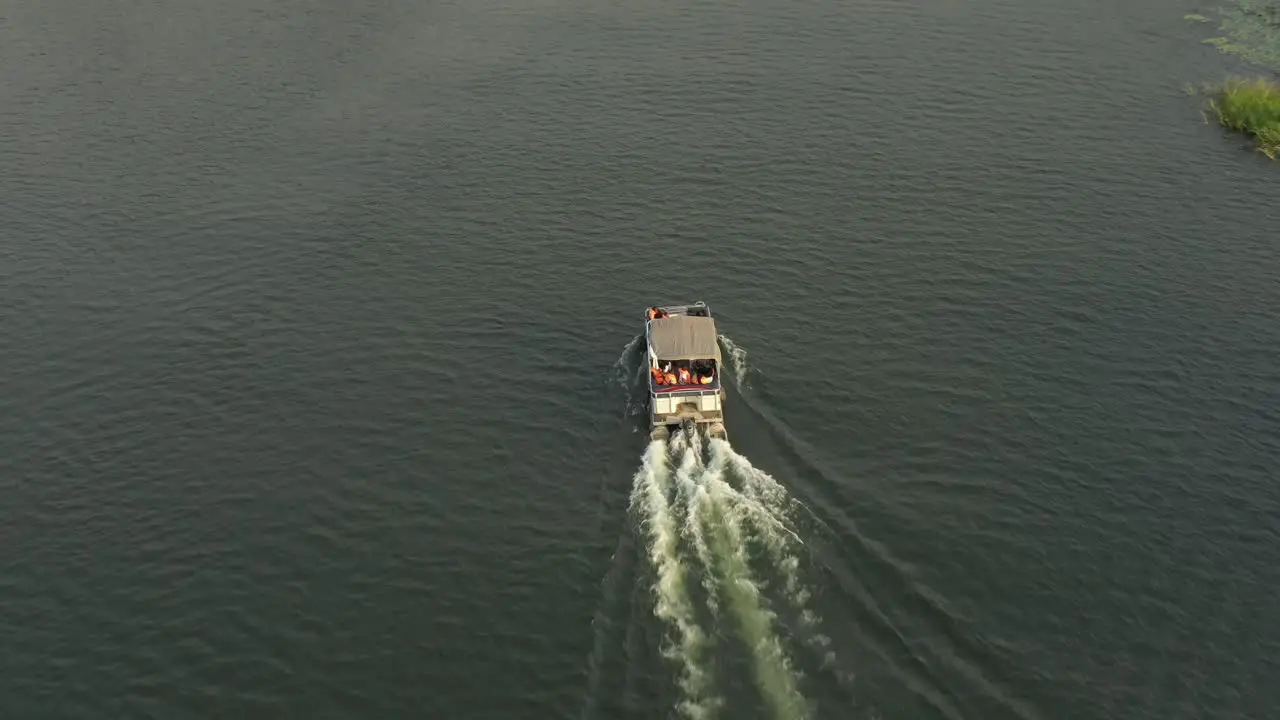 cruise boat with people on river_1