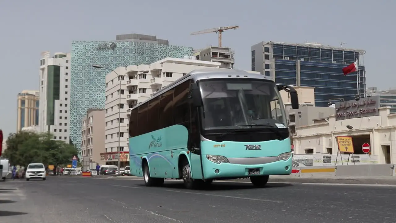 Karwa Public Transportation Bus passing by the street