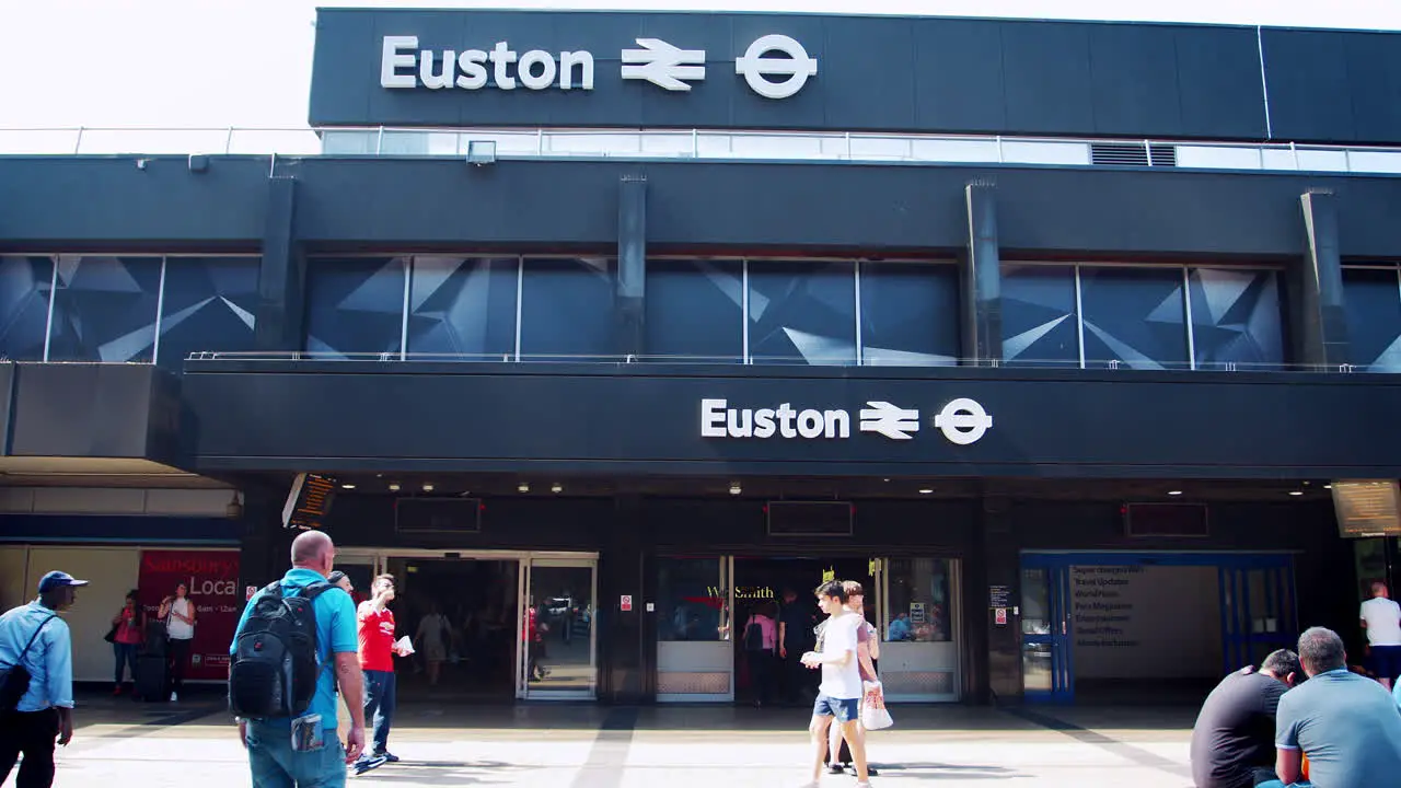 LONDON MAY 2017 People passing the entrance of Euston Station London NW1