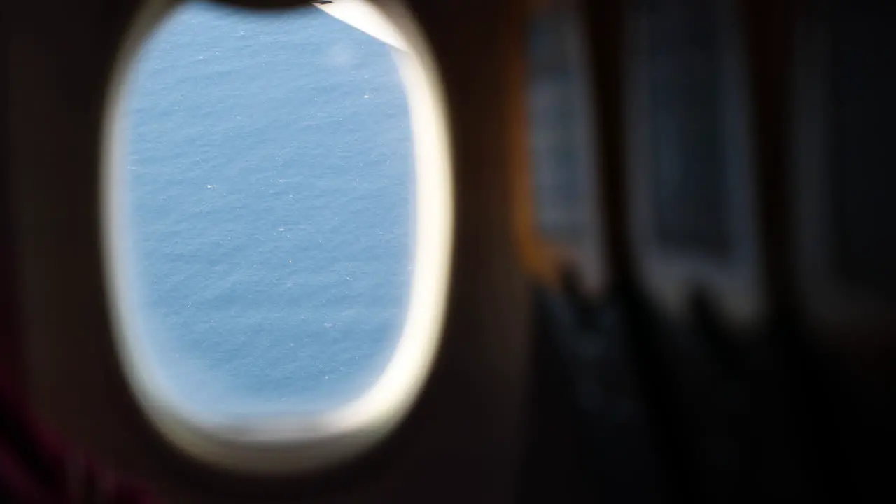 POV From An Airplane Window On The Ocean During Flight