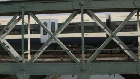 Pan of London Train On Railway Bridge