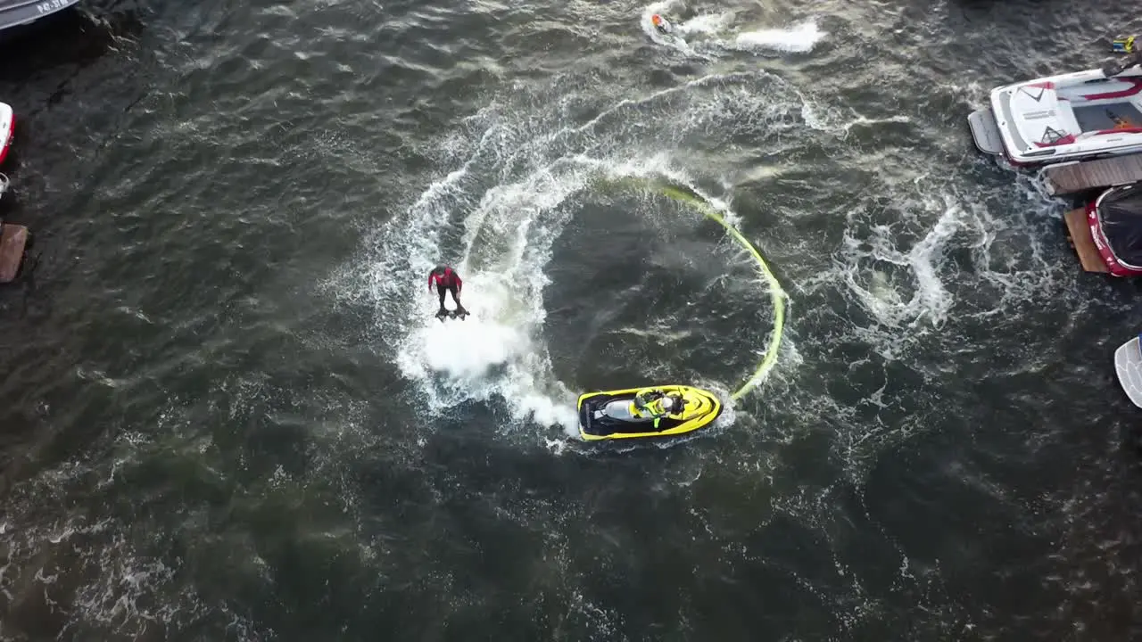 Aerial view of water jet flyboard performance