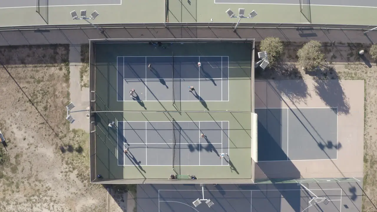 4K overhead shot of an afternoon pickle ball match