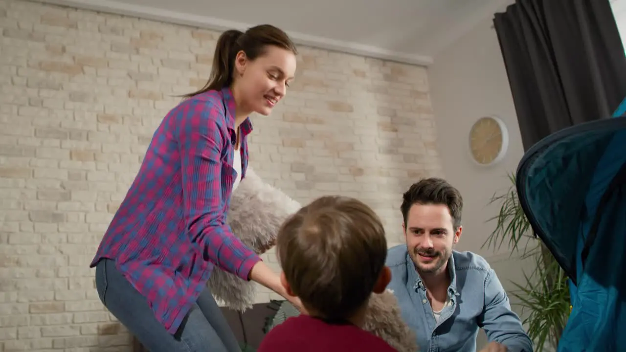 Video of family preparing tent at home