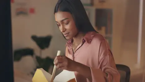 Young woman with chinese food