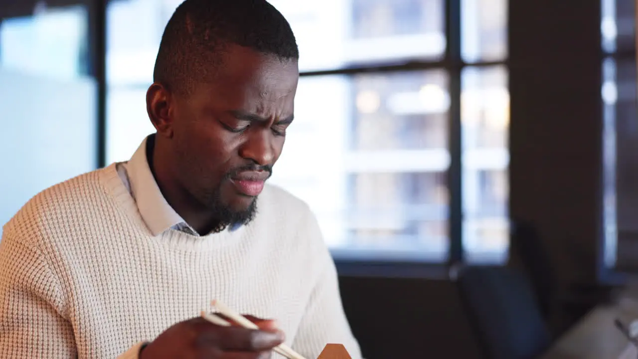 Black man fast food or lunch at desk in office