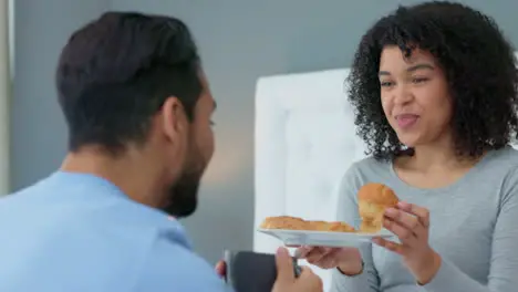 Couple love and food in bedroom for breakfast