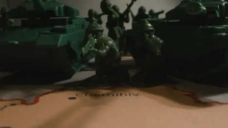 Tracking Shot of Toy Soldiers On Map of Ukraine 06