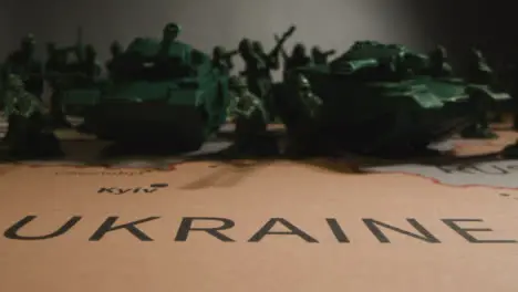 Tracking Shot of Toy Soldiers On Map of Ukraine 09