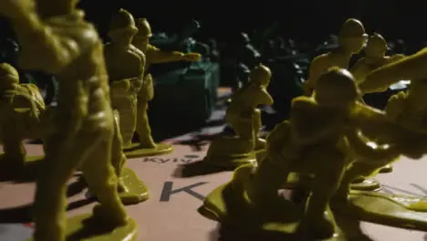 Tracking Shot of Toy Soldiers On Map of Ukraine 12